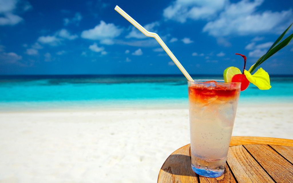 image of beach and cocktails